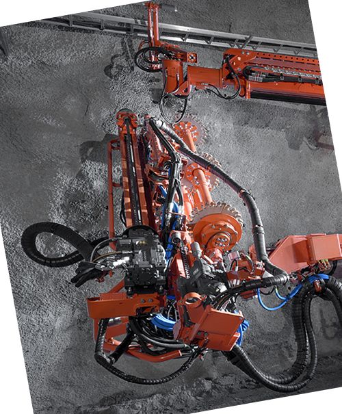 A coal mine drilling machine is working underground with DME&JDE hydraulic hoses.
