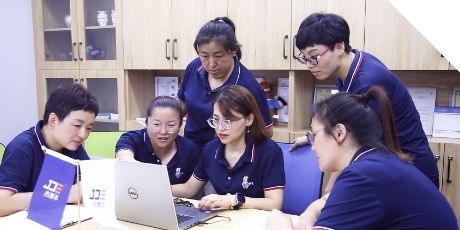 Several workers of DME&JDE Group are discussing customers case.