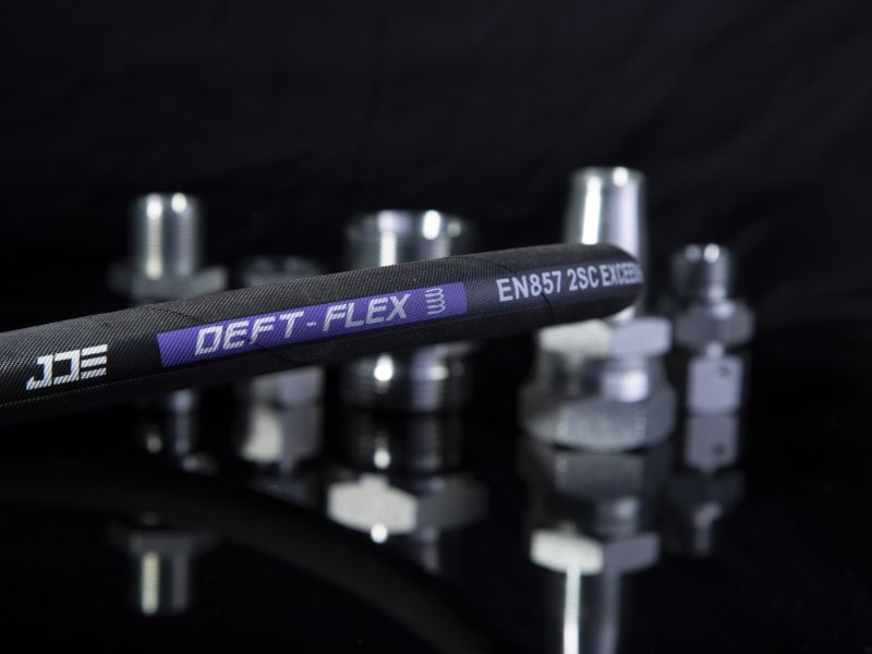 A piece of DME&JDE DEFT-FLEX series flexible hoses.