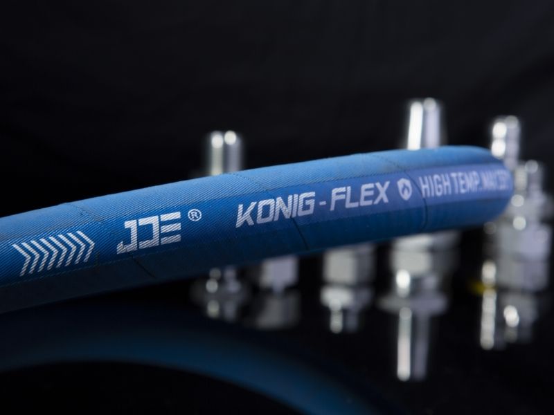 A piece of DME&JDE KONIG-FLEX series flexible hoses.