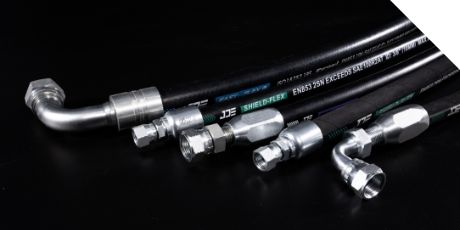 Several different types of DME&JDE hose assmeblies are displayed.