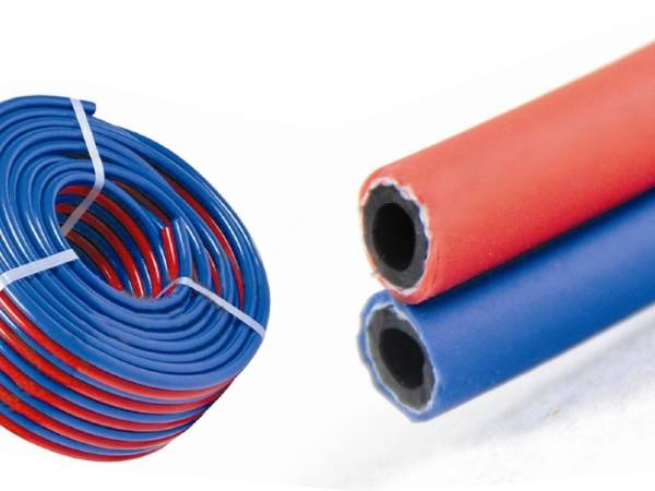 Blue and green PVC twin welding hose coils and PVC flexible hoses